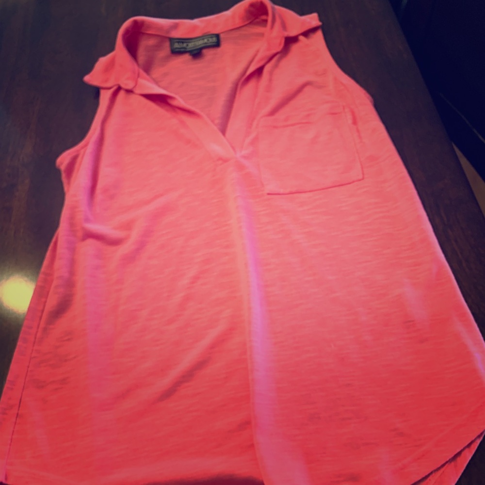Pink sleeveless polo